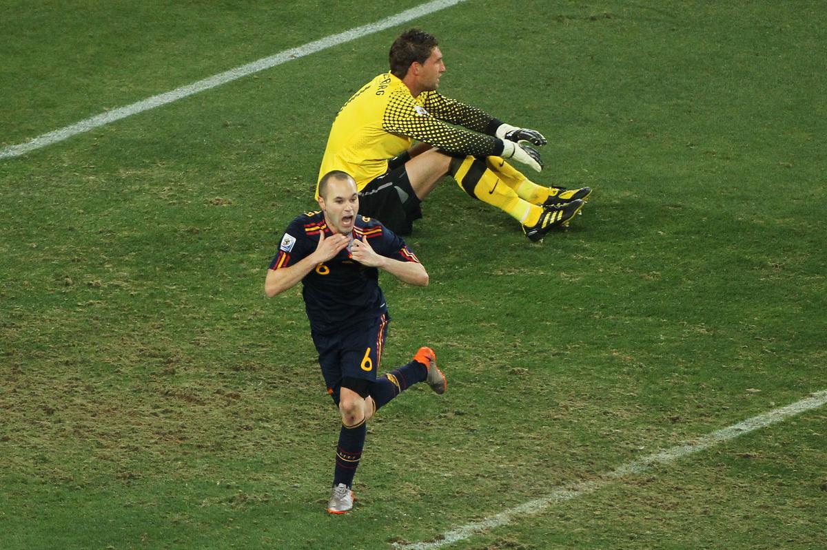 Spain’s Andres Iniesta (No. 6) beat the Netherlands goalkeeper Maarten Stekelenburg to score the only goal of the final. Spain won the match in extra-time to take the title.