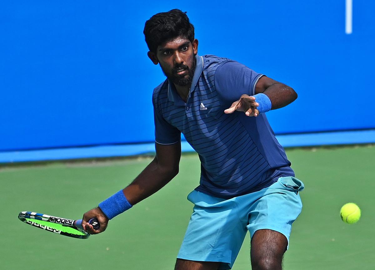 Abhinav Sanjeev Shanmugam in action at the National tennis championship in Delhi.