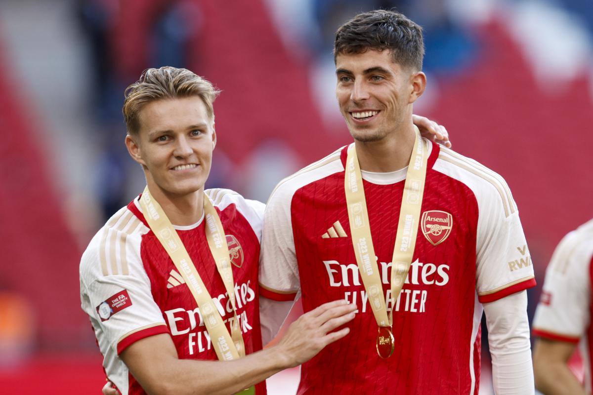 Arsenal’s Martin Odegaard, left, and Arsenal’s Kai Havertz celebrate after winning the English FA Community Shield final match between Arsenal and Manchester City at Wembley Stadium.
