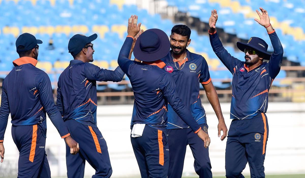 Vaisakh Chandran (second from right) was one of the key bowlers for Kerala, taking three wickets for 39 runs, helping his team into the quarters.