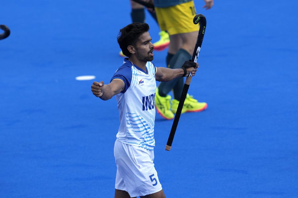 India’s Abhishek Abhishek celebrates after scoring his side’s opening goal during the men’s field hockey match between Australia and India at the Yves-du-Manoir Stadium, at the 2024 Summer Olympics, Friday, Aug. 2, 2024, in Colombes, France. 