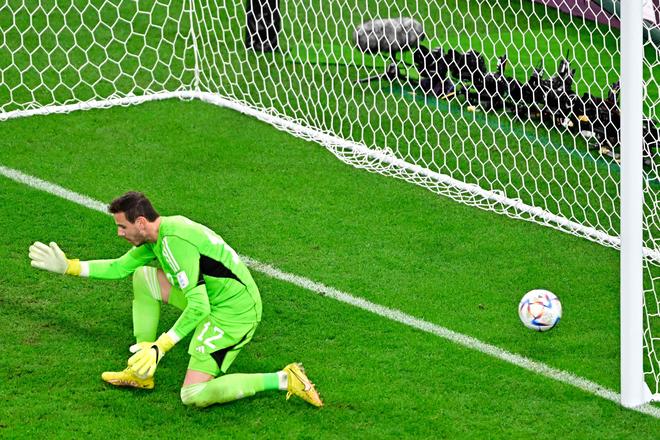 Wales’ goalkeeper Ward concedes England’s third goal at the Ahmad Bin Ali Stadium in Al-Rayyan, west of Doha on November 29, 2022.