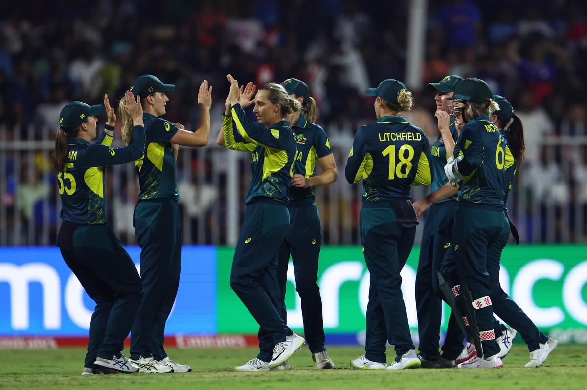 Start of the decline: Ashleigh Gardner of Australia celebrates with team mates after taking the wicket of opener Shafali Verma.