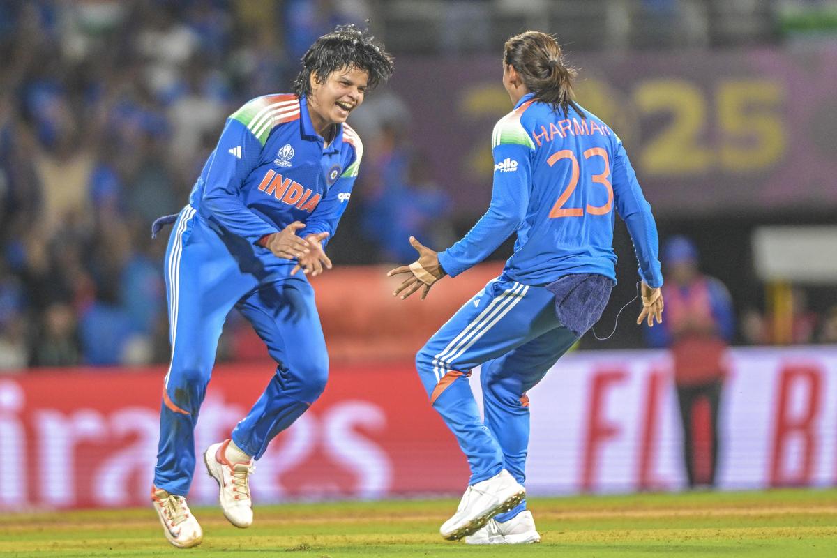 Shafali Verma (left) celebrates the wicket of South Africa's Marizanne Kapp during the ICC Women’s World Cup Final. 