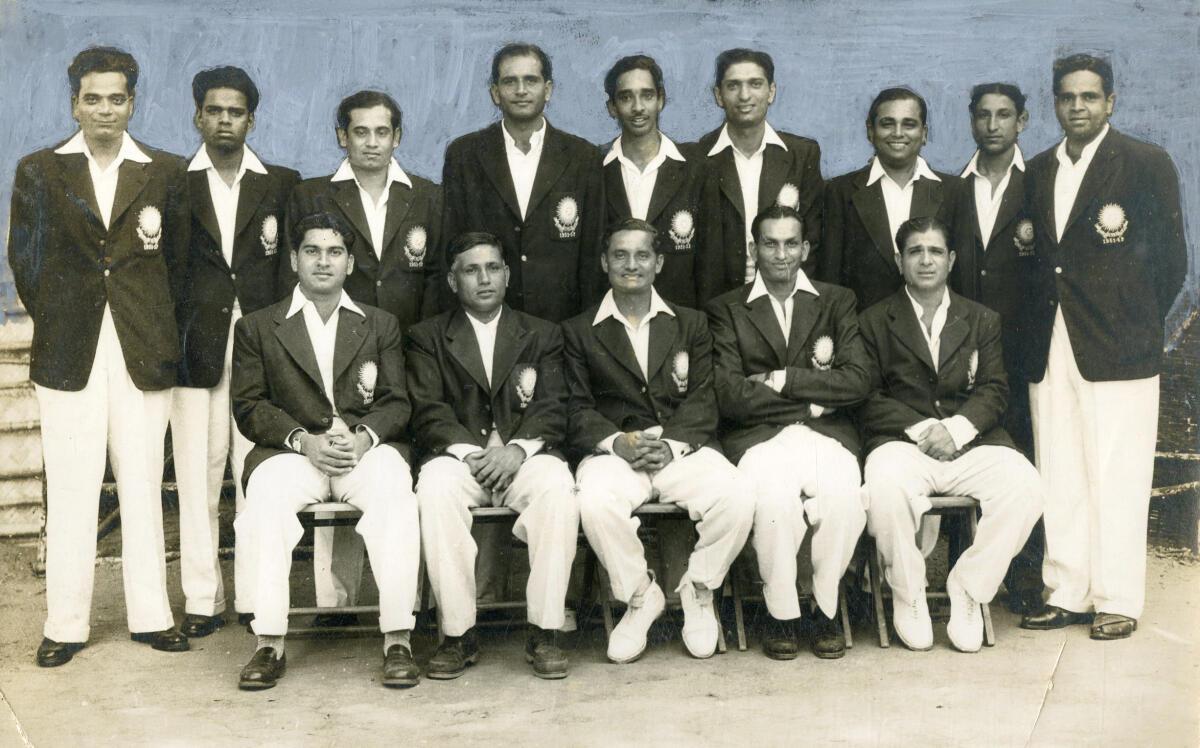 Group photo of the Indian Cricket team during the Vth Test match between MCC and India XI at the Chepauk Cricket stadium in Madras on February 09, 1952. Standing from left: S.G. Sindhe, V.L. Manjerakar, P. Roy, Ghulam Ahmed, C.D. Gopinath, P.R. Umrigar, P. Sen, P.S. Joshi, R. V. Divecha. Sitting from left: D.G. Phadkar, L. Amarnath, V. Hazare, Mushtaq Ali and V. Mankad. 