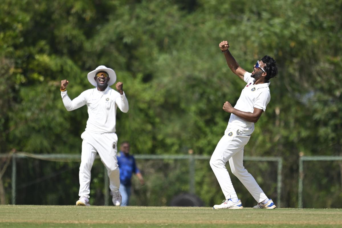 Kerala’s Jalaj Saxena and captain Sachin Baby celebrate wicket of Nitish Rana during Ranji Trophy Cricket match between Kerala and Uttar Pradesh.