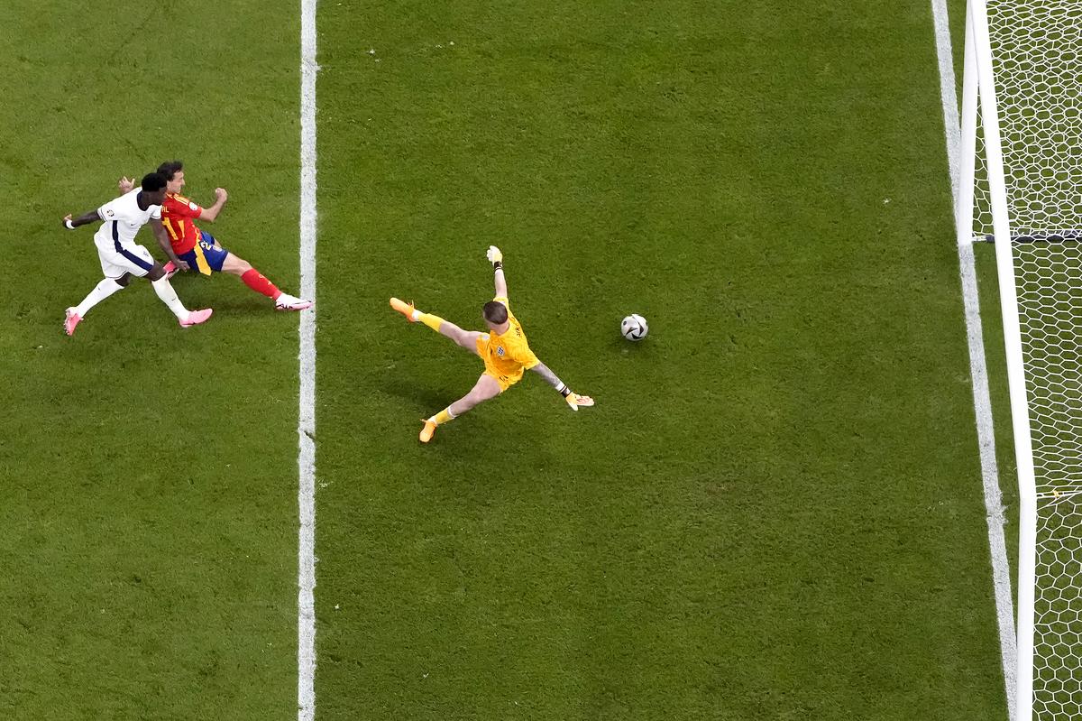 On target: Mikel Oyarzabal (in red) had the simplest poke at the ball to put it past Jordan Pickford (right).