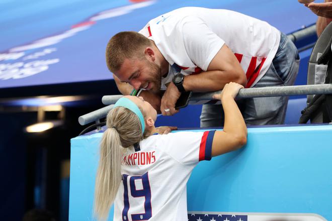 Julie Ertz celebrates with her husband, NFL player Zach Ertz, following USA’s victory in the 2019 FIFA Women’s World Cup final. 