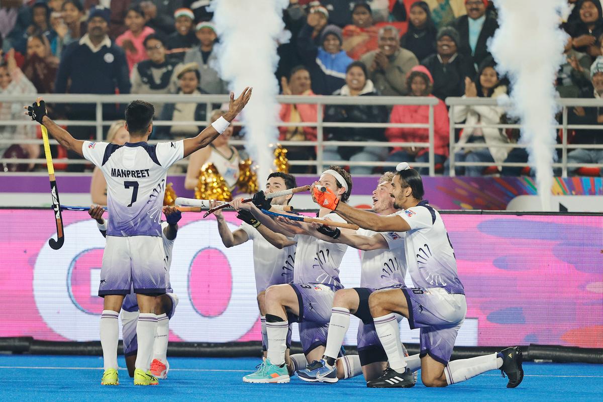 Team Gonasika’s Manpreet Singh scored a goal and celebrates.