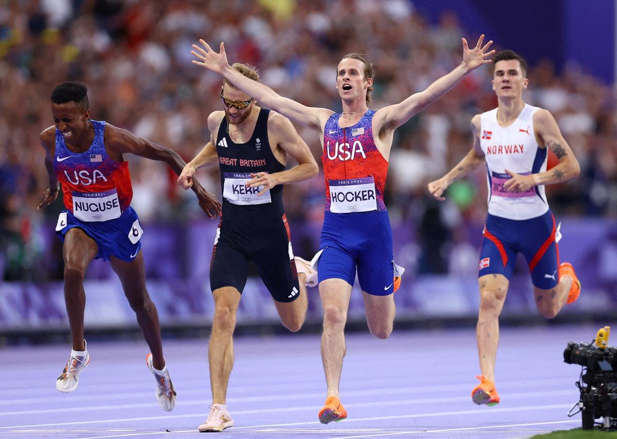 Cole Hocker of United States finishes to win gold ahead of Josh Kerr of Britain, Yared Nuguse of United States and Jakob Ingebrigtsen of Norway. 