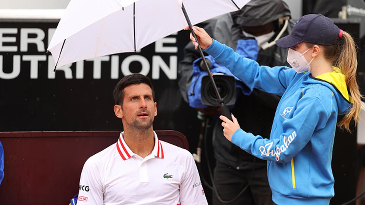 Djokovic loses cool, wins match against Fritz in Rome rain