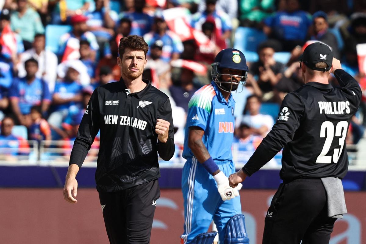 FILE PHOTO: Mitchell Santner celebrates the wicket of KL Rahul during the India vs New Zealand game in the 2025 Champions Trophy 