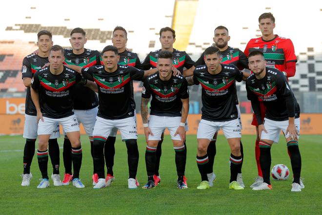 Players of the Palestino football club pose for a picture before the Chilean championship match against Colo-Colo at the Estadio Monumental in Santiago on April 23, 2023. 