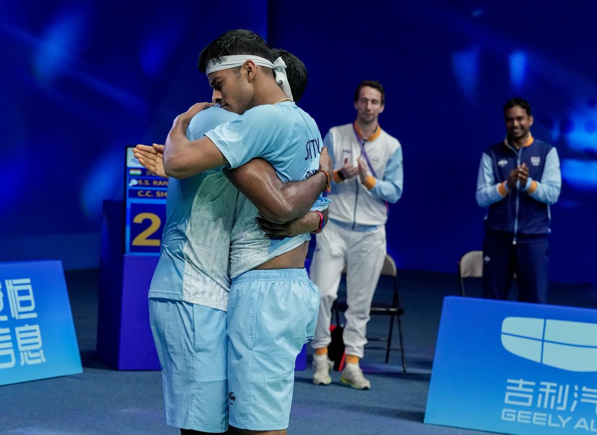 Relief and joy: Satwiksairaj Rankireddy and Chirag Shetty react after winning the second game in the men’s doubles semifinal badminton match against Malaysia at the 19th Asian Games.