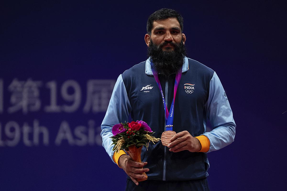 On course: Asian Games bronze medalist Sunil Kumar (87kg, right) and Gyanender (60kg) were among the notable winners in Greco-Roman competitions, nurturing aspirations of Olympic participation.