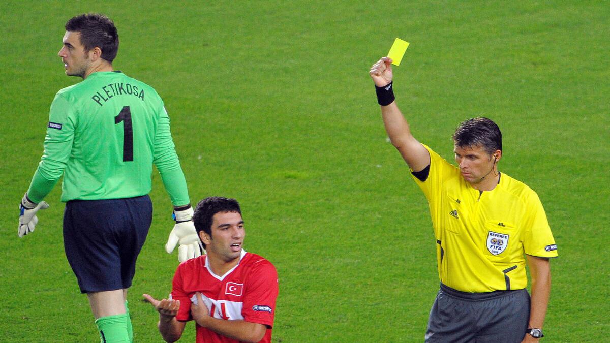 UEFA to referees: Punish players who exaggerate physical contact