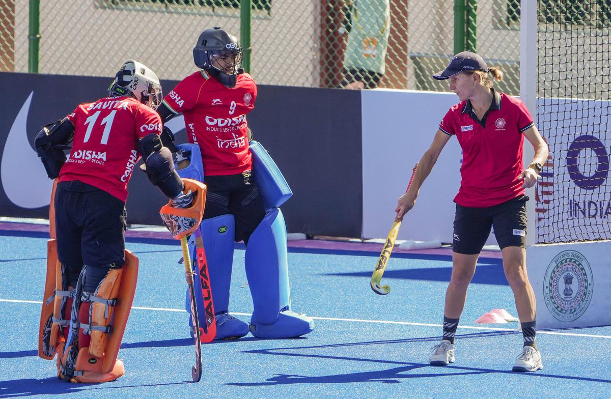 FILE PHOTO: Indian women’s hockey team captain Savita Punia (left) with teammate Bichu Devi Kharibam (centre) and former head coach Janneke Schopman (right) during a training session.