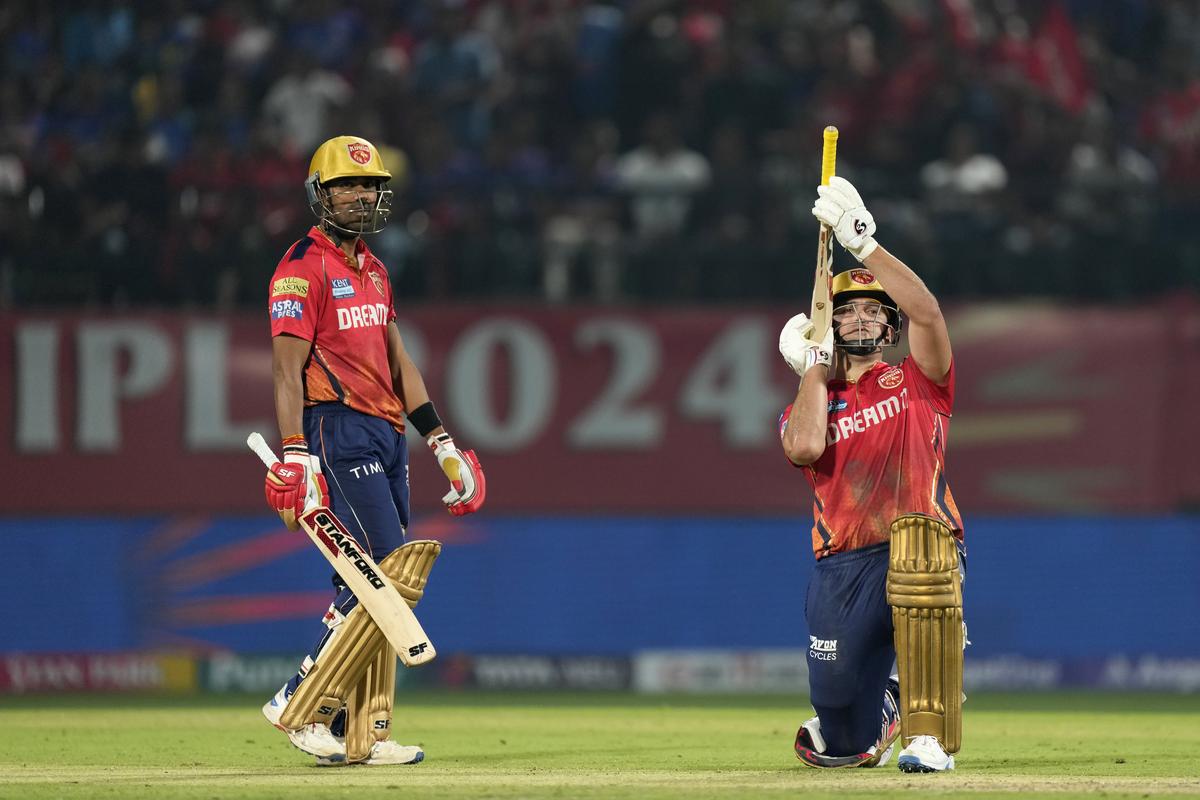 Rilee Rossouw (R) celebrates his fifty as Shashank Singh looks on during the Indian Premier League match between Punjab Kings and Royal Challengers Bengaluru.