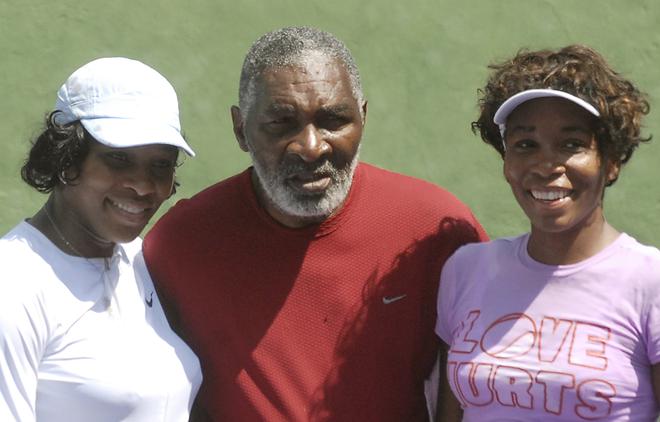 FILE PHOTO: Tennis stars Serena Williams (left) and Venus Williams (right) with their father Richard Williams (centre) during a practice session in Bangalore on March 2, 2008. They were here to participate in the WTA Bangalore  Open Tennis Championship. 