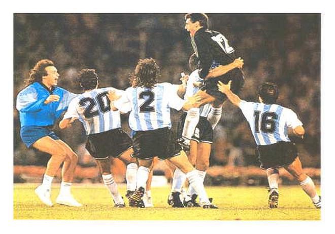 The legend of Sergio Goycochea-in action against Yugoslavia (left, below) and being chaired by his ecstatic teammates after saving a crucial penalty against Italy - began after 12 minutes in the match against the Soviets. And, after the World Cup, the Argentine goalkeeper is almost as popular as Diego Maradona, back home.