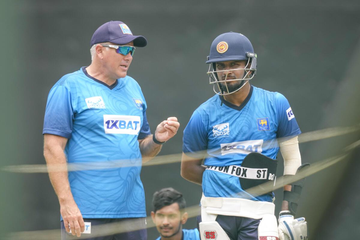 Sri Lanka captain Dasun Shanaka along with coach Chris Silverwood during a practice session in Pallekele.