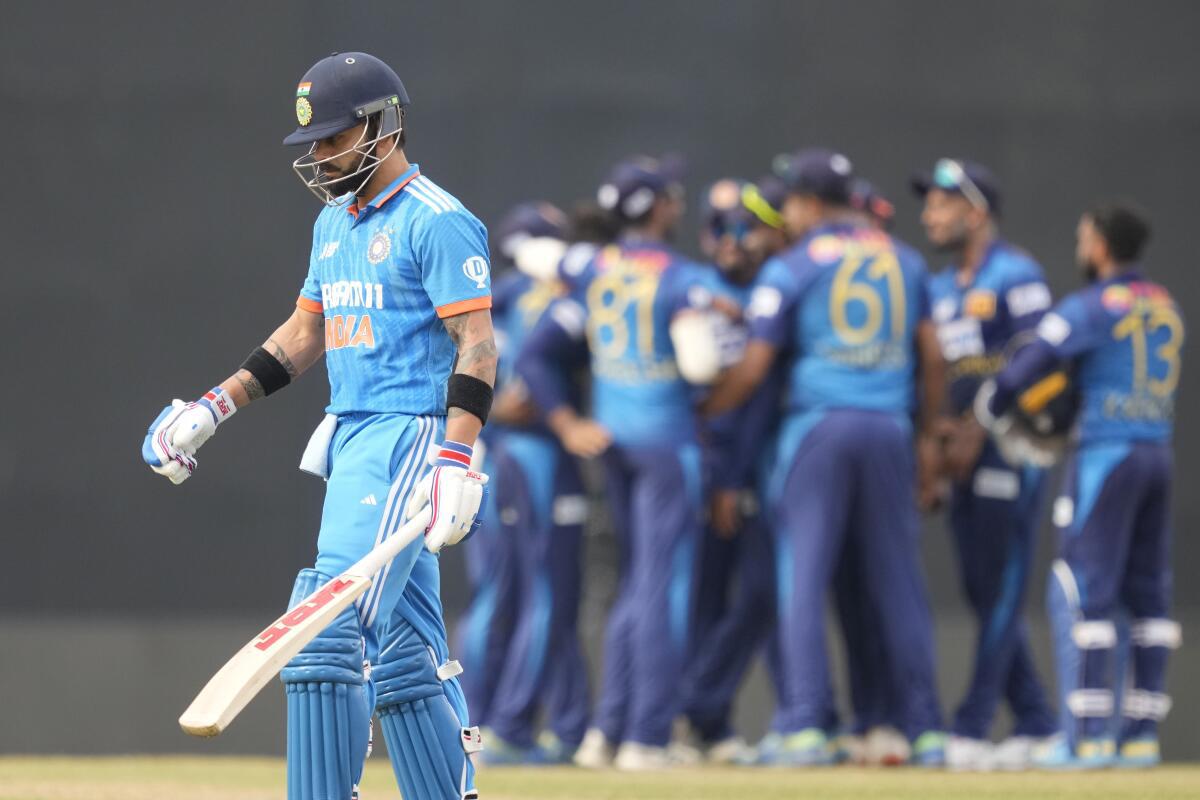 Virat Kohli walks back after getting dismissed during India’s Asia Cup 2023 match against Sri Lanka. 