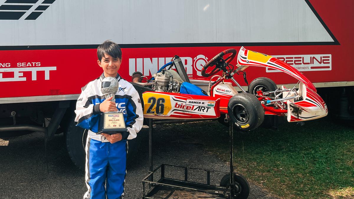 Hamza Balasinorwala with the trophy.