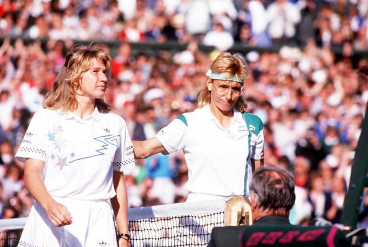 Germany’s Steffi Graf (left) is patted on the back by USA’s Martina Navratilova (right) after the 1988 Wimbledon final.