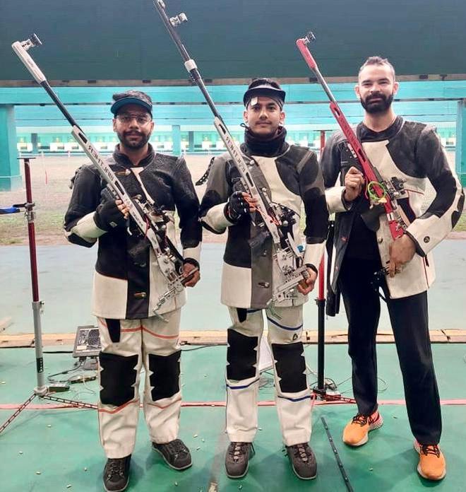 From left to right: Pankaj Mukheja, champion Aishwary Pratap Singh Tomar and Akhil Sheoran in rifle 3-position event of the National shooting selection trials in Delhi on Thursday.