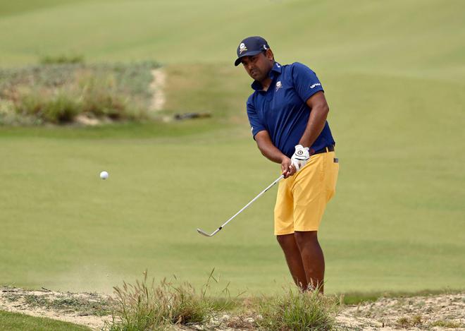 Anirban Lahiri of India hitting a shot during round four of the International Series Vietnam golf tournament in Cam Ranh.