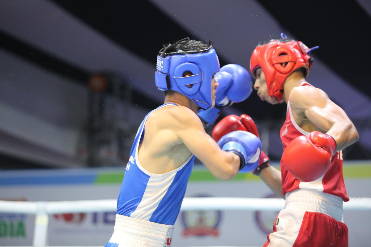 Devang (in blue) in action against UP’s Sundram Yadav at the Junior Boys National Boxing Championships. He won the bout 5-0.