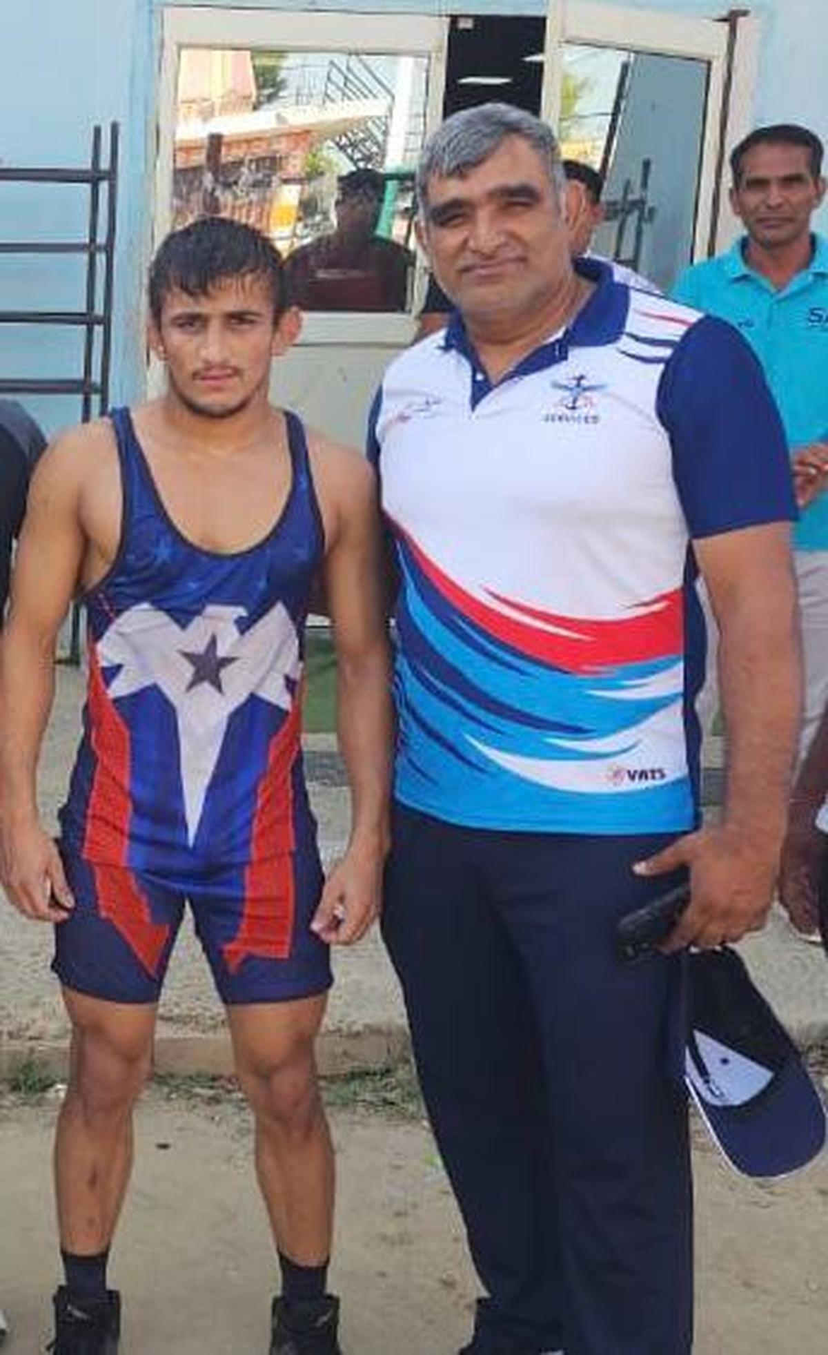 Chirag Chikkara and his coach Kuldeep Sehrawat. 