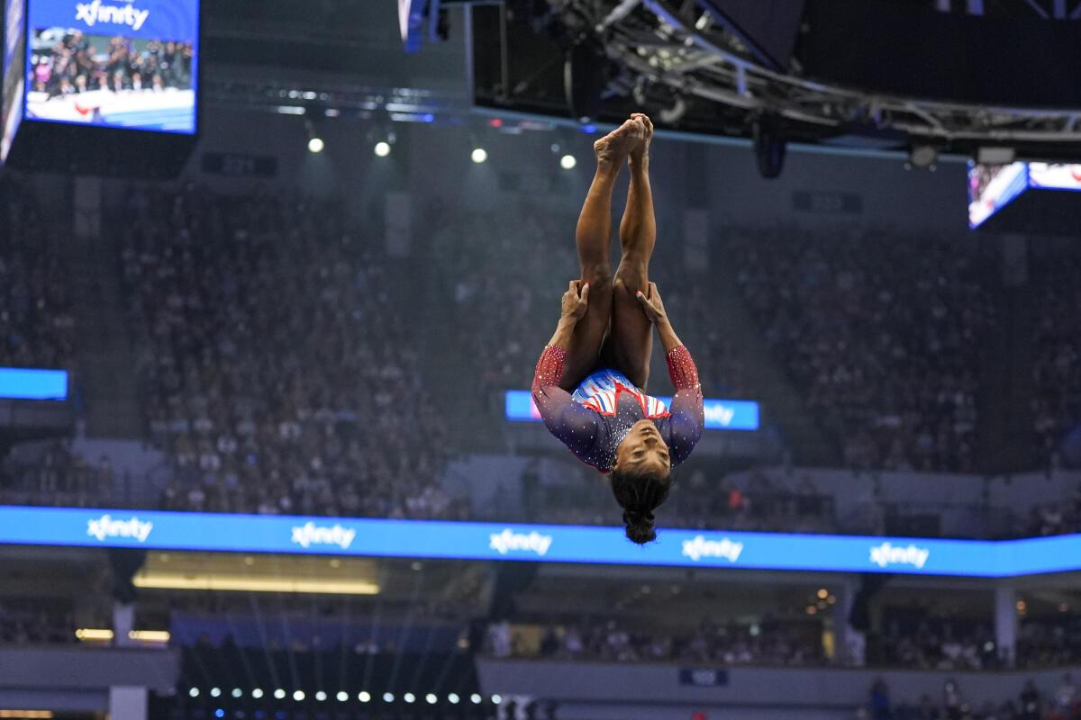 Simone Biles competes on the vault at the United States Gymnastics Olympic Trials in June 2024. 