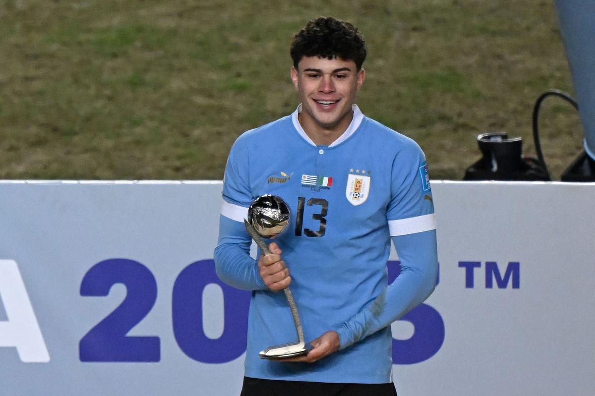 Uruguay’s defender Alan Matturro holds the Silver Ball Award. 