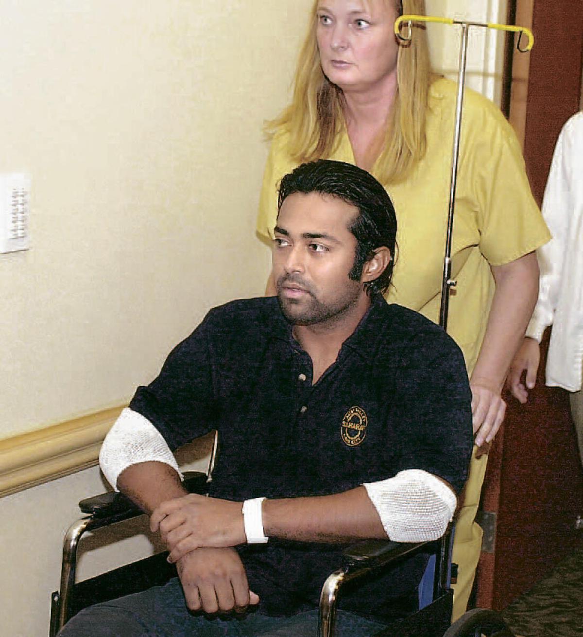 LIGHT AT THE END OF THE TUNNEL: Leander Paes is brought into a news conference at the M.D. Anderson Cancer Center in Orlando onMonday, where he would say that he was greatly relieved that he did not have cancerous tumour. 