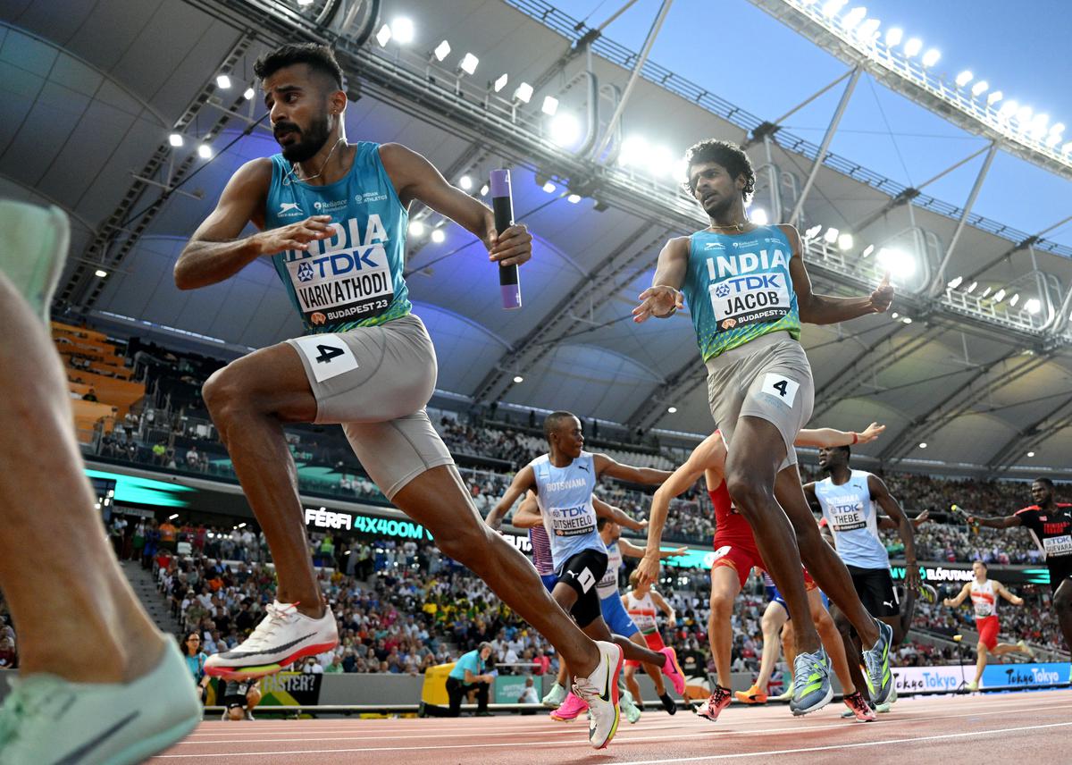 On song: Amoj Jacob hands the baton to Muhammed Ajmal Variyathodi in the Men’s 4x400m relay heats during the World Athletics Championships Budapest 2023.