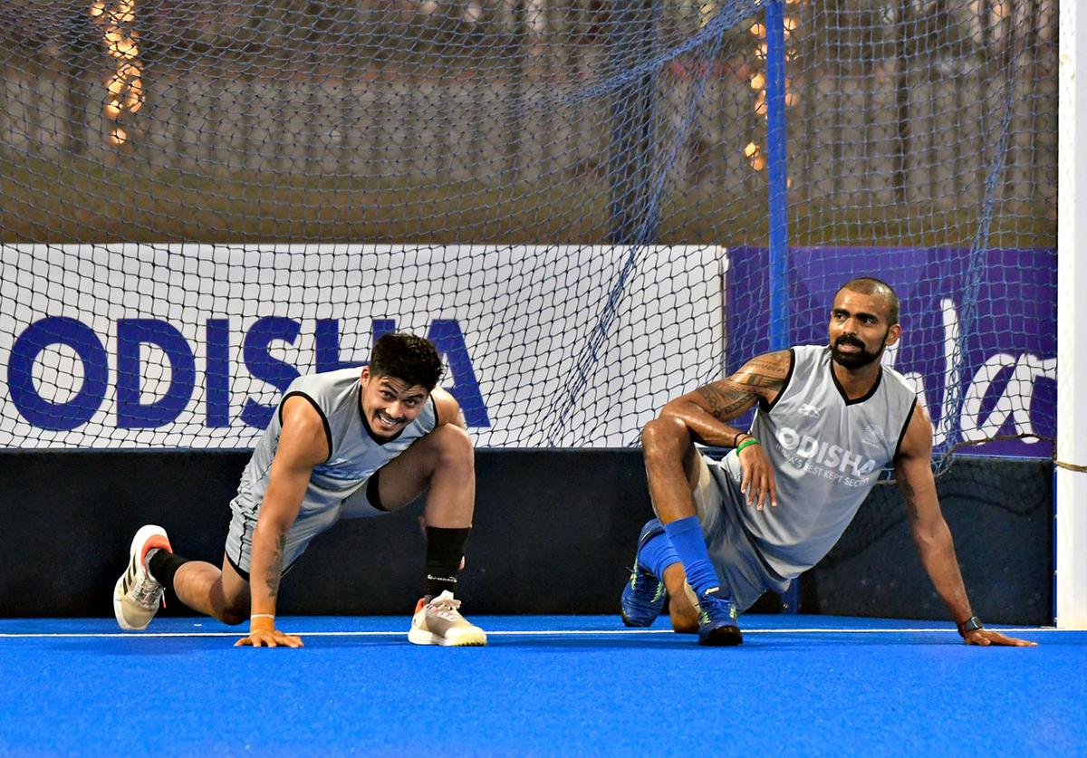 FILE PHOTO: Indian hockey team goalkeepers Krishan Pathak (left) and P R Shreejesh (right). 