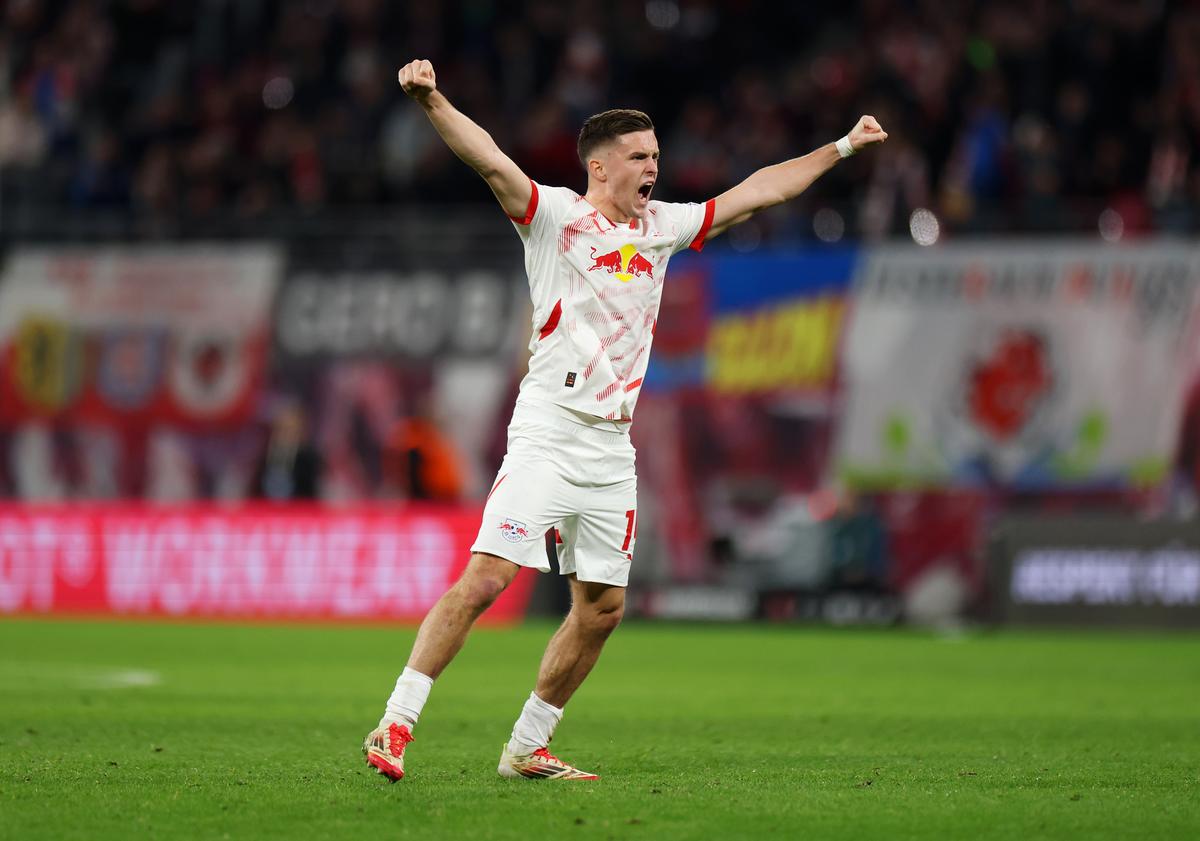 Christoph Baumgartner of RB Leipzig celebrates their sides second goal, after an own goal by Edmond Tapsoba of Bayer 04 Leverkusen (not pictured) following a VAR decision during the Bundesliga match between RB Leipzig and Bayer 04 Leverkusen at Red Bull Arena on January 25, 2025 in Leipzig, Germany.