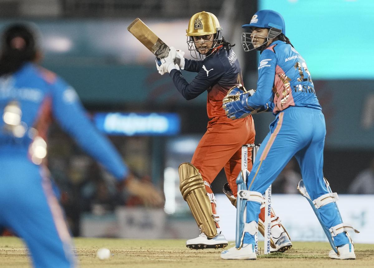 Royal Challengers Bengaluru’s Smriti Mandhana plays a shot during the Women’s Premier League (WPL) 2025 cricket match between Royal Challengers Bengaluru and Mumbai Indians, in Mumbai, Tuesday, March 11, 2025.