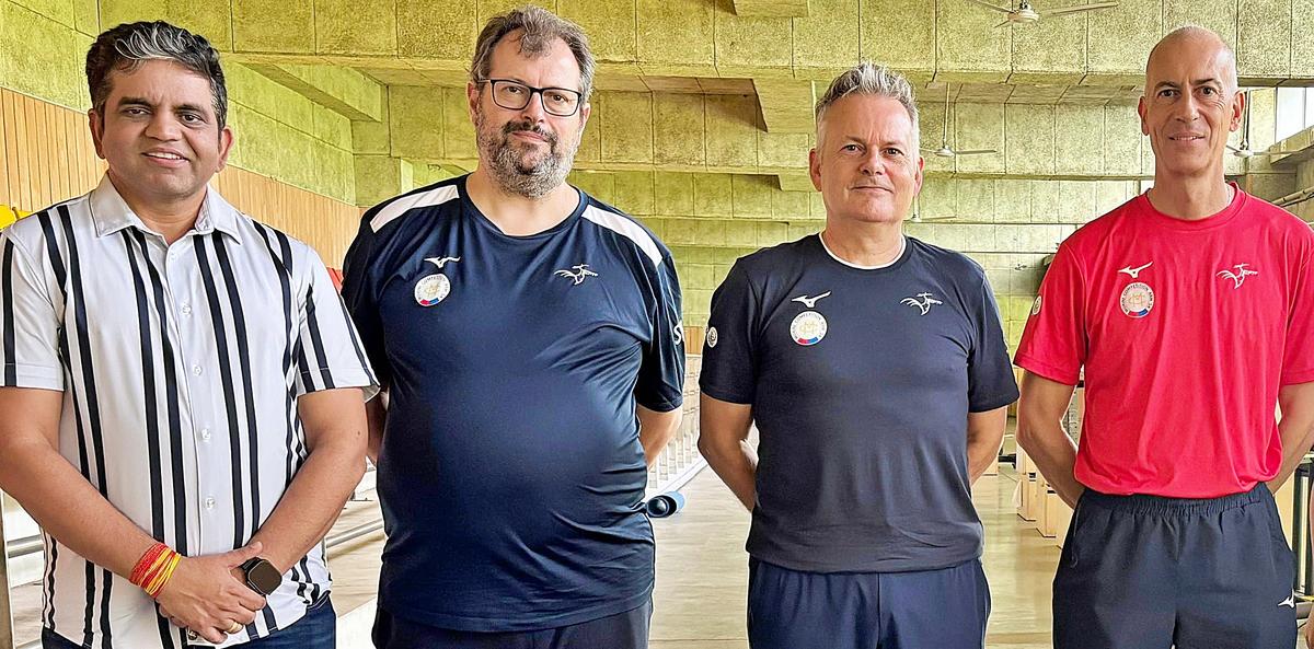 Co-founder and Director of Gun for Glory, Pawan Singh (left) with the French delegation of shooting experts in Pune.