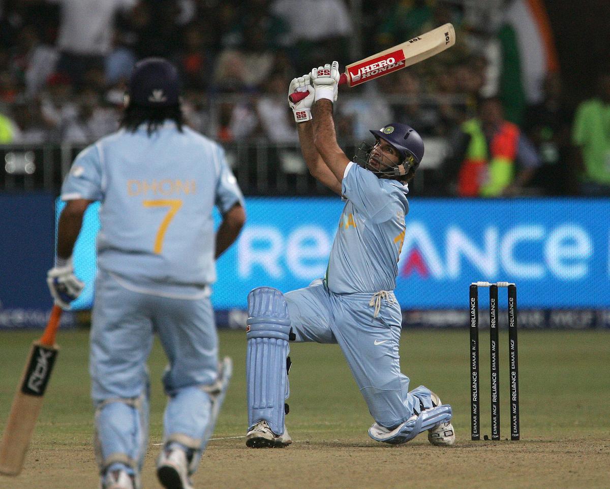 FILE PHOTO: India’s Yuvraj Singh slams his 4th six off the ball of England’s Stuart Broad. 