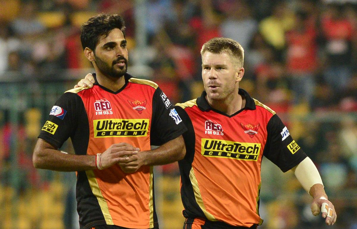 Sunrisers Hyderabad’s captain David Warner (right) having a word with Bhuvneshwar Kumar during the 2016 IPL final.. 