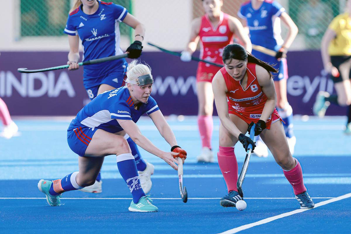 Czechia skipper Katerina Lacina (blue) in action. 