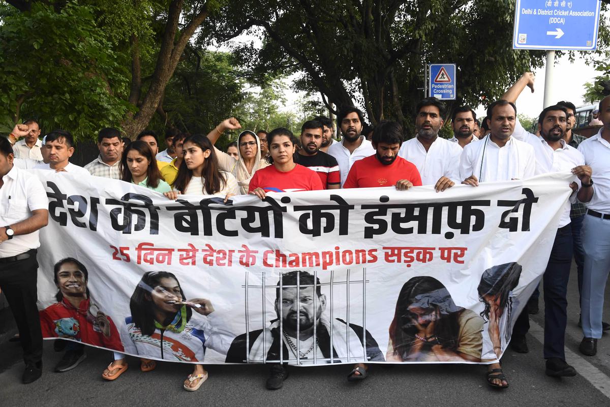 Wrestlers Sakshi Malik, Bajrang Punia, Vinesh Phogat, Sangeeta Phogat with supporters during their protest march to demands arrest of Wrestling Federation of India Chief Brij Bhushan Sharan Singh. 