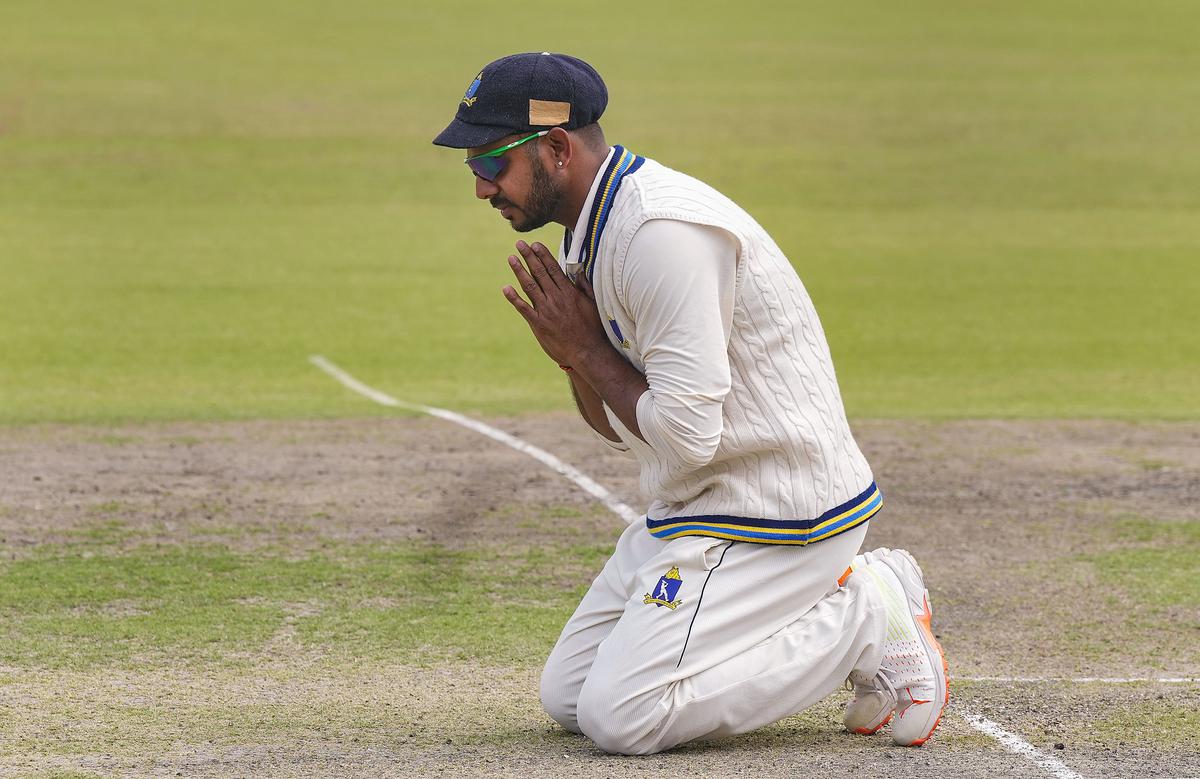 Bengal skipper Manoj Tiwary prays at the pitch after the team’s win in the Ranji Trophy match against Bihar.