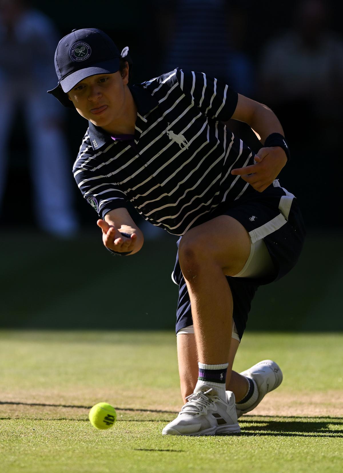 Ground reality: The primary responsibility of ball boys and girls is to efficiently remove balls from the playing area and then quickly return to their stationary positions.