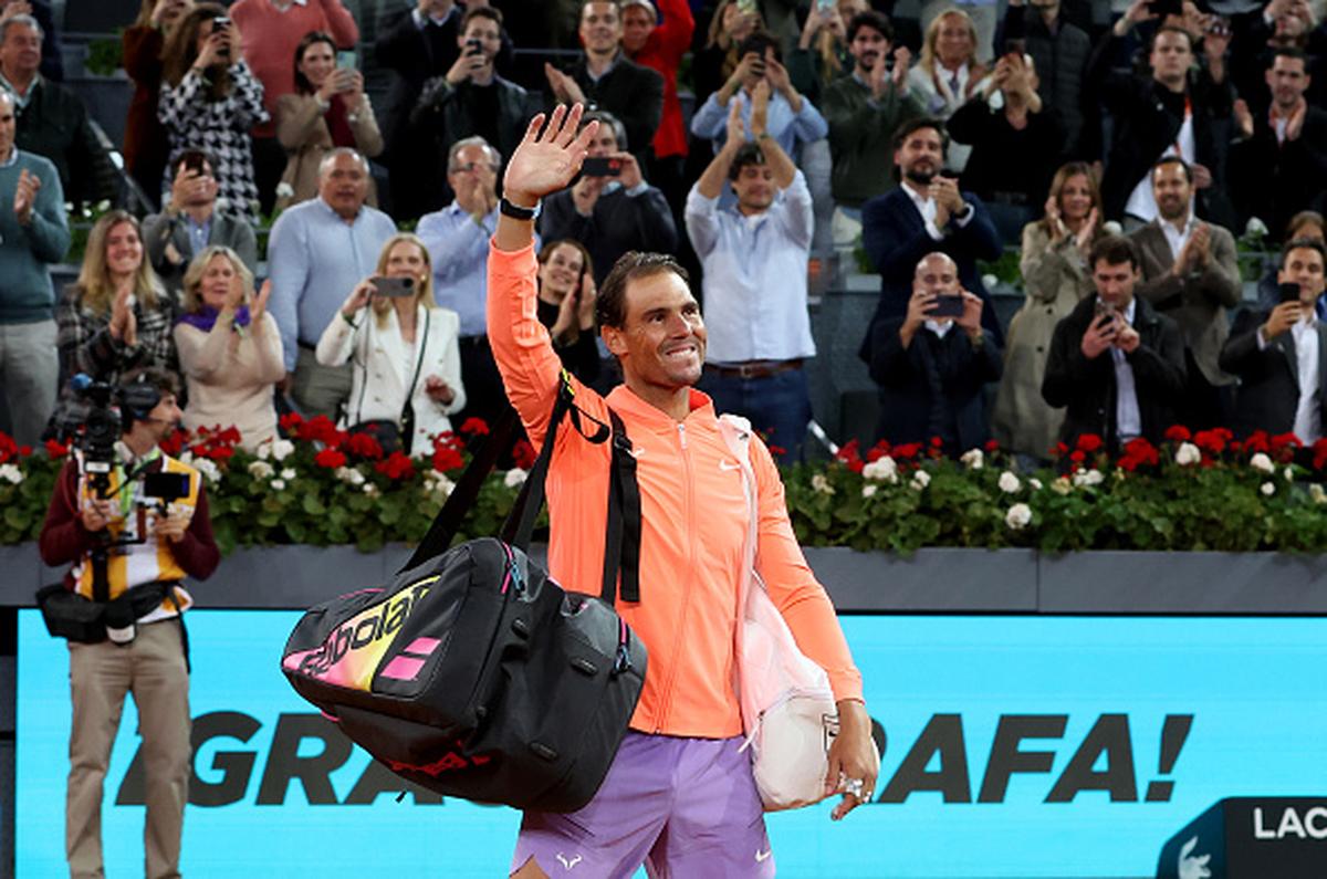 Spain’s Rafael Nadal waves goodbye to the fans after defeat against Czech Republic’s Jiri Lehecka during their round of 16 match at Madrid Open on April 30, 2024.