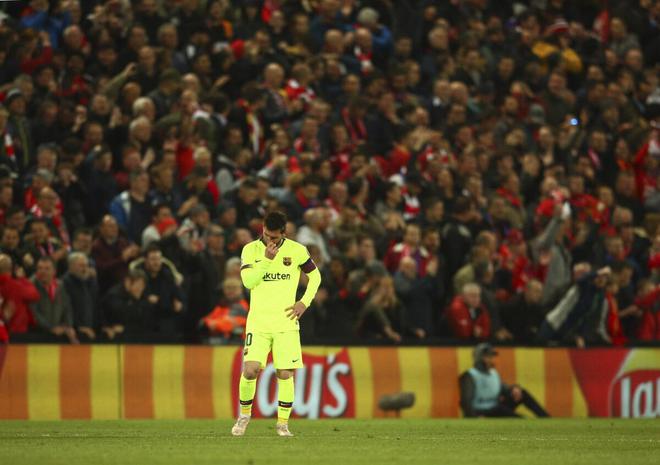 Messi reacts after a 4-0 loss to Liverpool in 2018-19.