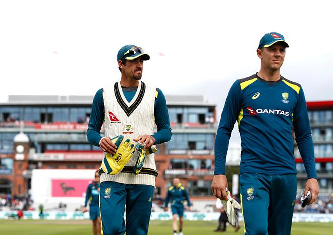 FILE PHOTO: Australian pacers Mitchell Starc (left) and Josh Hazlewood (right) are set to miss the Nagpur Test due to injuries.