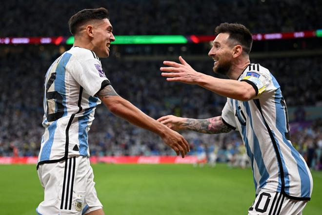 Nahuel Molina celebrates with Lionel Messi of Argentina after scoring the team’s first goal during the FIFA World Cup Qatar 2022 quarterfinal match between Netherlands and Argentina at Lusail Stadium on December 09, 2022, in Lusail City, Qatar.